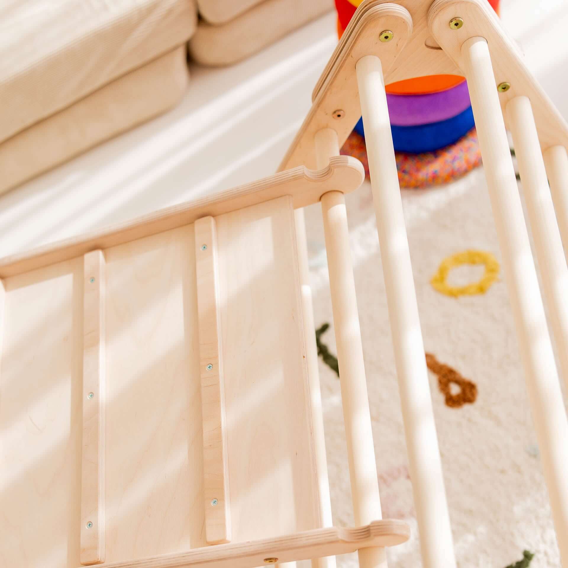 Top view of Kletterset Panda's wooden climbing triangle with smooth design, perfect for children's play and development.
